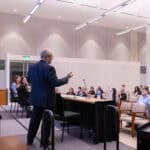 Judge Cumba giving a lecture to students as part of the Trial Program